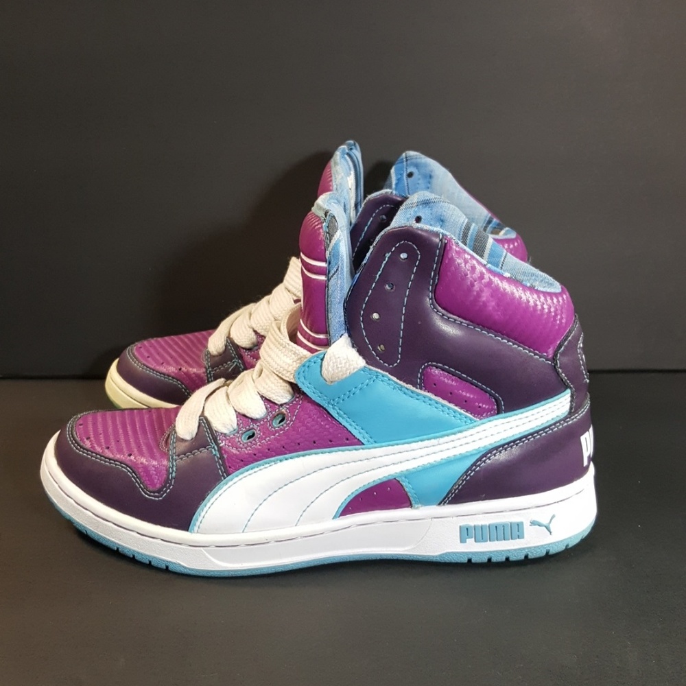 Discontinued Puma high tops, size 9, very stylish.